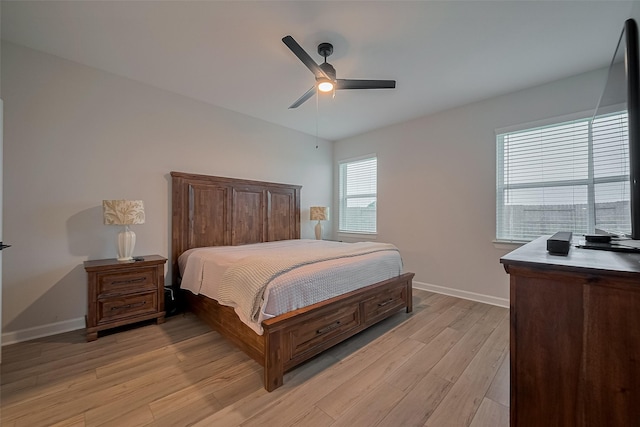 3213 Overfalls Dr, Santa Fe, TX 77510 - bedroom featuring light wood-style flooring and ceiling fan