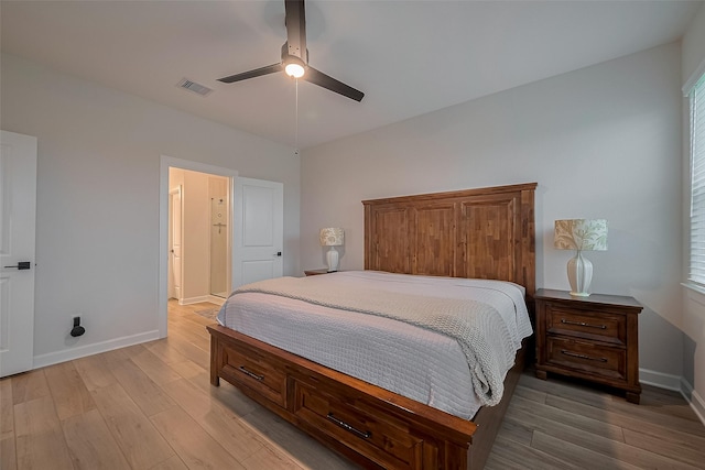3213 Overfalls Dr, Santa Fe, TX 77510 - bedroom with light wood finished floors, a ceiling fan, and multiple windows