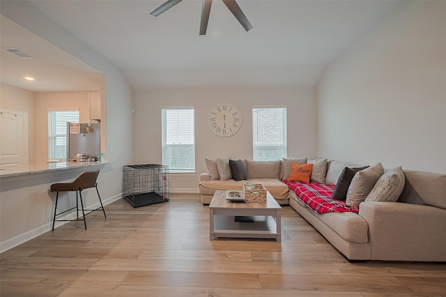 3213 Overfalls Dr, Santa Fe, TX 77510 - living room with a ceiling fan, plenty of natural light, light wood-type flooring, and vaulted ceiling