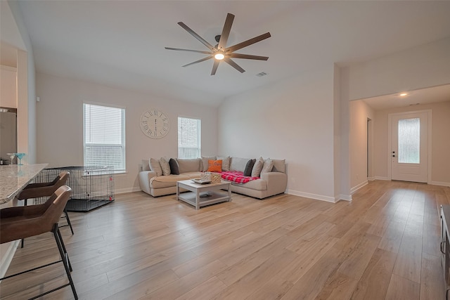3213 Overfalls Dr, Santa Fe, TX 77510 - living room featuring ceiling fan, light wood-style floors, and lofted ceiling