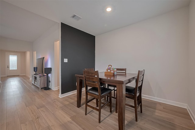 3213 Overfalls Dr, Santa Fe, TX 77510 - dining room with light wood finished floors and recessed lighting