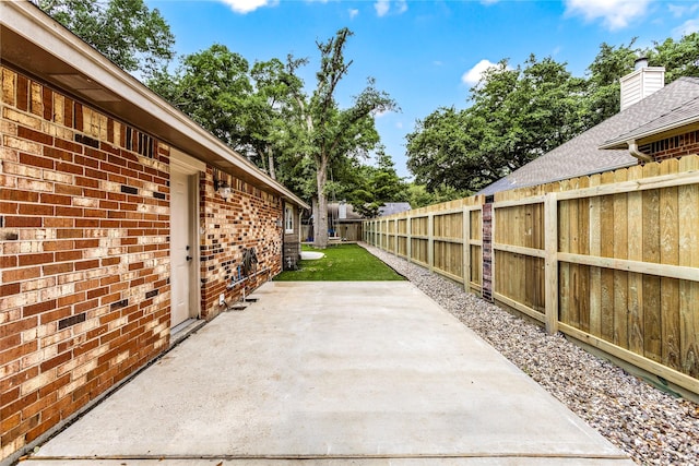 112 April Wind Dr E, Montgomery, TX 77356 - fenced backyard with a patio area