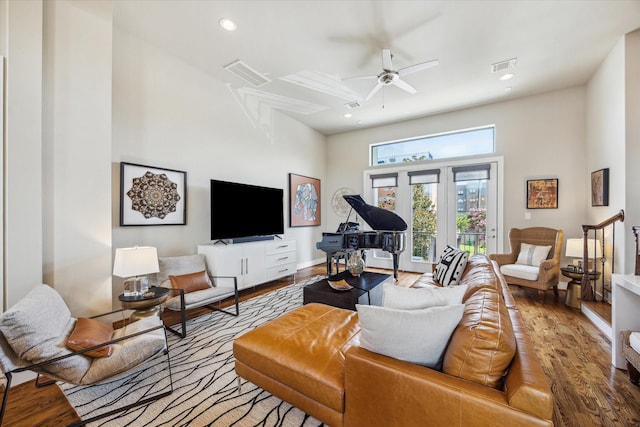 4102 Marina St, Houston, TX 77007 - living area with a high ceiling, wood finished floors, recessed lighting, and a ceiling fan