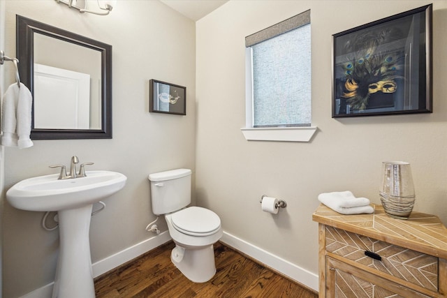 4102 Marina St, Houston, TX 77007 - half bath featuring toilet and wood finished floors