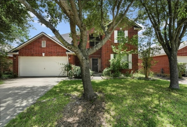 1327 Bartlett Cove Dr, Houston, TX 77067 - traditional-style house with driveway, a garage, a front lawn, and brick siding
