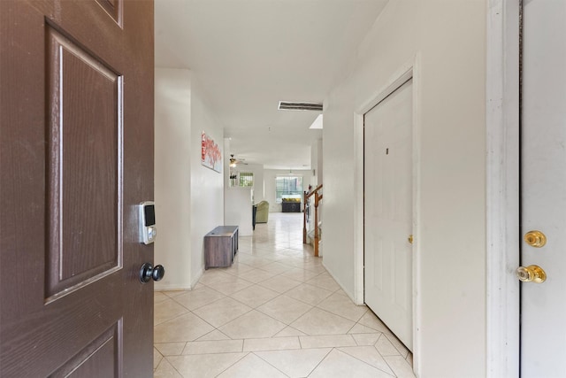 1327 Bartlett Cove Dr, Houston, TX 77067 - corridor with light tile patterned flooring
