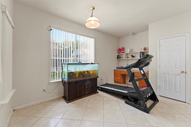 1327 Bartlett Cove Dr, Houston, TX 77067 - exercise room featuring light tile patterned floors