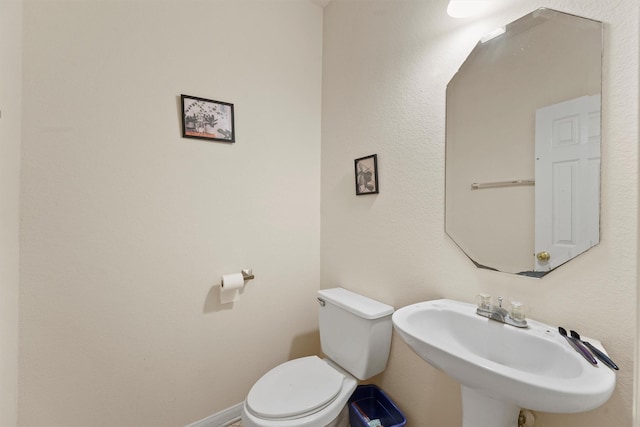 1327 Bartlett Cove Dr, Houston, TX 77067 - bathroom featuring a sink and toilet