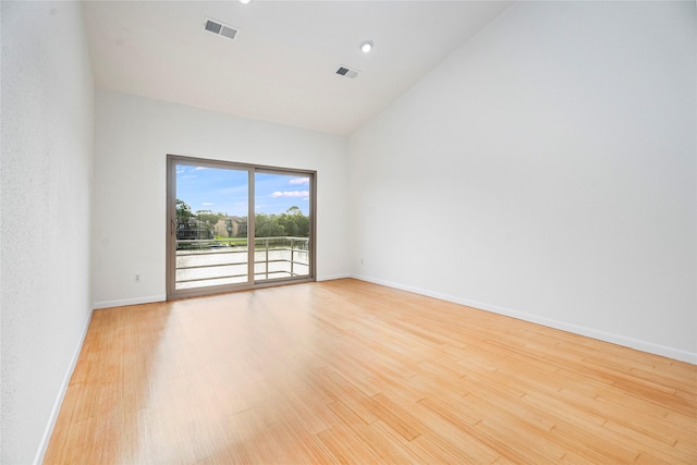 18405 Sandy Cv, Houston, TX 77058 - unfurnished room featuring wood finished floors and high vaulted ceiling