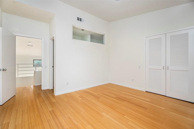 18405 Sandy Cv, Houston, TX 77058 - unfurnished bedroom featuring light wood-type flooring and a closet