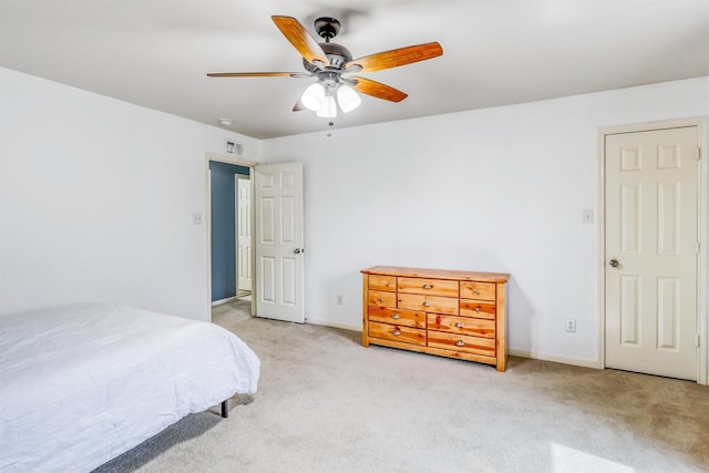 2726 Indigo Stone Ln, Katy, TX 77449 - bedroom with light carpet and a ceiling fan