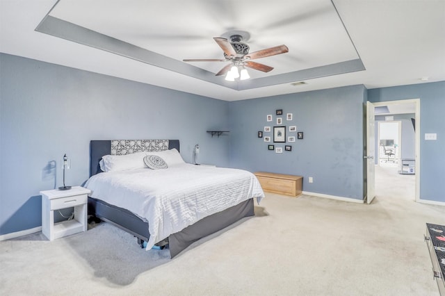 2726 Indigo Stone Ln, Katy, TX 77449 - carpeted bedroom with a raised ceiling and ceiling fan