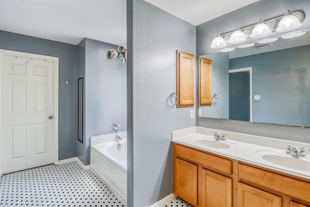2726 Indigo Stone Ln, Katy, TX 77449 - bathroom with a bath and double vanity