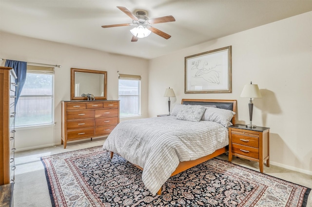 2726 Indigo Stone Ln, Katy, TX 77449 - bedroom with light colored carpet and ceiling fan