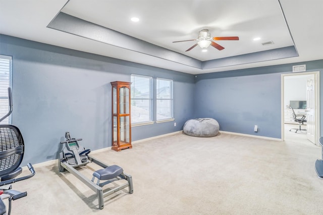 2726 Indigo Stone Ln, Katy, TX 77449 - exercise area with a raised ceiling, carpet, and ceiling fan