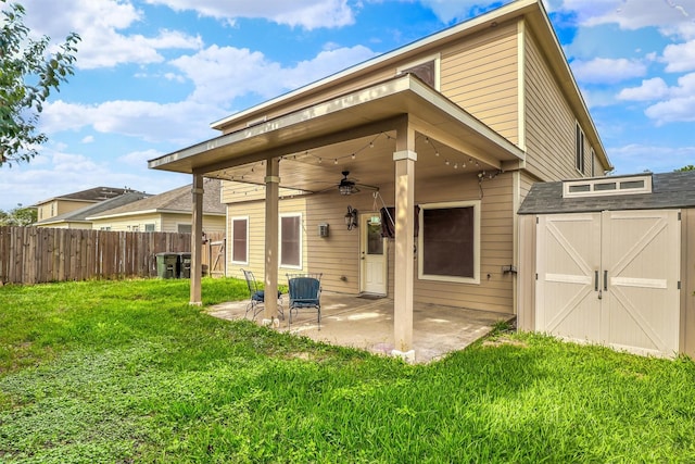 2726 Indigo Stone Ln, Katy, TX 77449 - back of property with a ceiling fan, a patio, and a shed
