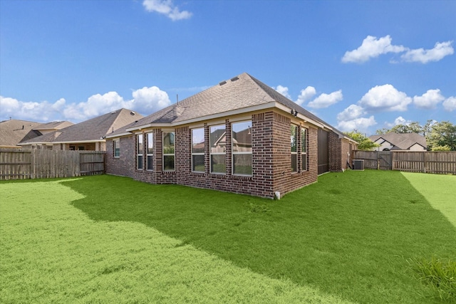 5803 Manning Hollow Ln, Sugar Land, TX 77479 - back of house with a fenced backyard and brick siding