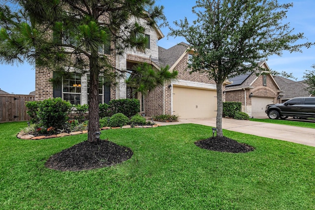 9215 Union Meadow Ln, Cypress, TX 77433 - view of front facade featuring brick siding, driveway, and an attached garage
