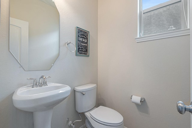9215 Union Meadow Ln, Cypress, TX 77433 - half bath with toilet and a sink