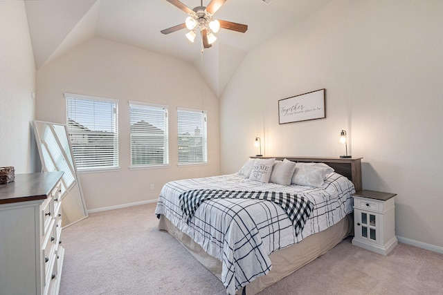 9215 Union Meadow Ln, Cypress, TX 77433 - bedroom with multiple windows, light colored carpet, vaulted ceiling, and ceiling fan