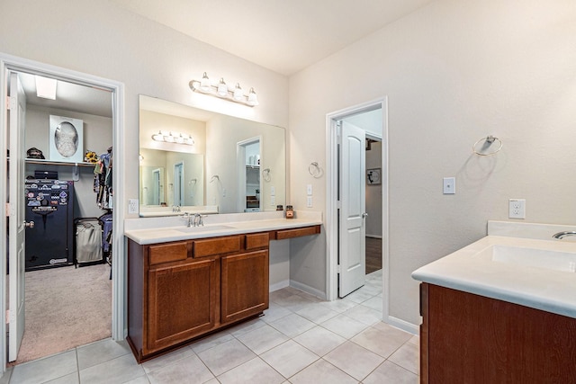 9215 Union Meadow Ln, Cypress, TX 77433 - full bath featuring vanity, tile patterned floors, and a walk in closet