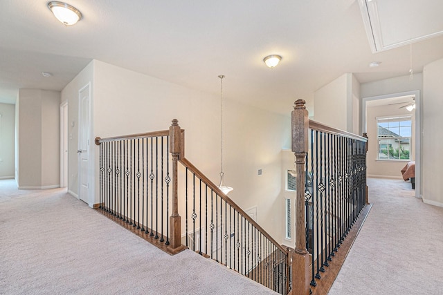 9215 Union Meadow Ln, Cypress, TX 77433 - corridor with attic access, an upstairs landing, and carpet flooring