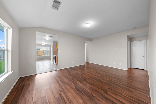 14239 Brunswick Point Ln, Houston, TX 77047 - unfurnished room with dark wood-style floors and lofted ceiling