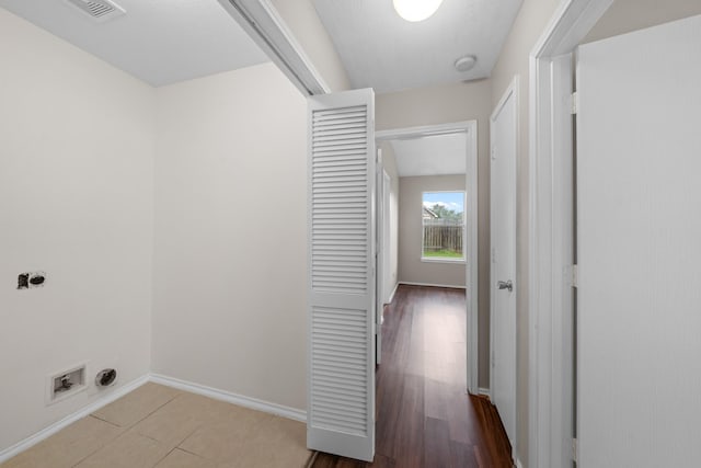 14239 Brunswick Point Ln, Houston, TX 77047 - laundry room with electric dryer hookup and baseboards