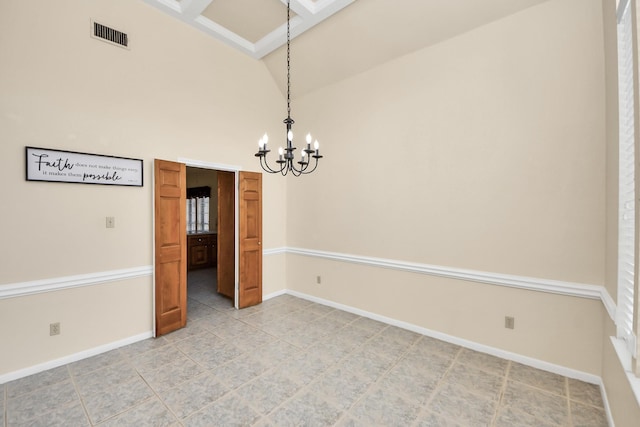 10503 Great Plains Ln, Houston, TX 77064 - unfurnished dining area featuring a chandelier, a towering ceiling, light tile patterned flooring, and a skylight