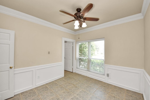 10503 Great Plains Ln, Houston, TX 77064 - empty room featuring ornamental molding, a ceiling fan, a wainscoted wall, light tile patterned flooring, and a decorative wall