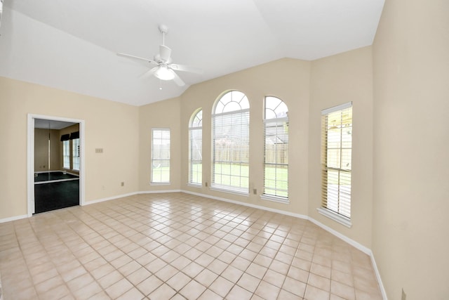 10503 Great Plains Ln, Houston, TX 77064 - spare room with lofted ceiling, plenty of natural light, a ceiling fan, and light tile patterned floors