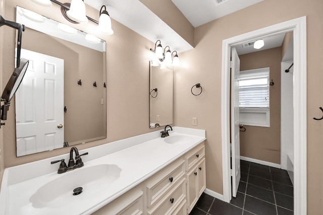 10503 Great Plains Ln, Houston, TX 77064 - bathroom with tile patterned floors, double vanity, and shower / bathtub combination