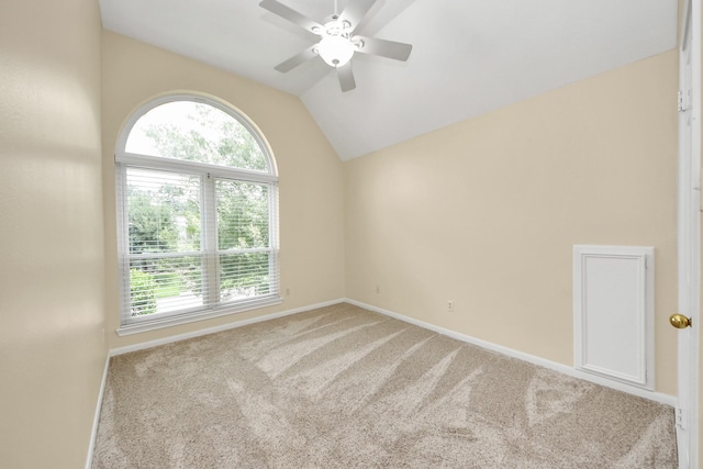 10503 Great Plains Ln, Houston, TX 77064 - empty room featuring carpet flooring, ceiling fan, and vaulted ceiling