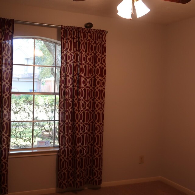1714 Oak Ridge Dr, Kemah, TX 77565 - unfurnished room featuring ceiling fan and baseboards