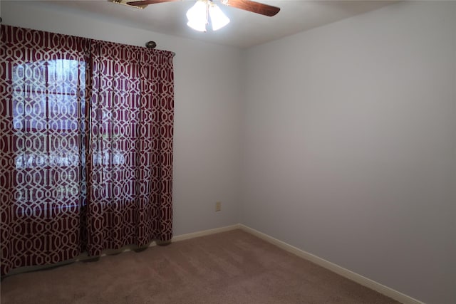 1714 Oak Ridge Dr, Kemah, TX 77565 - empty room with ceiling fan and carpet flooring