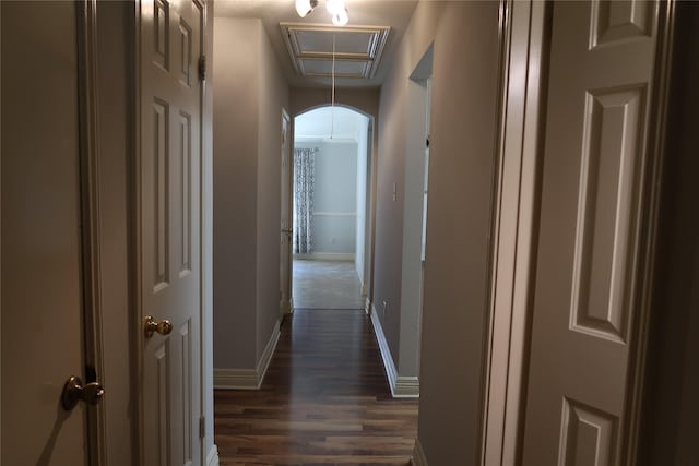 1714 Oak Ridge Dr, Kemah, TX 77565 - corridor with dark wood finished floors and attic access