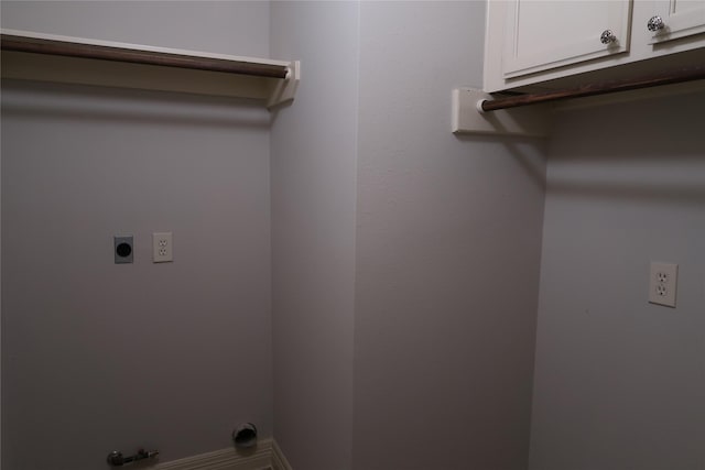 1714 Oak Ridge Dr, Kemah, TX 77565 - washroom with gas dryer hookup, electric dryer hookup, and cabinet space