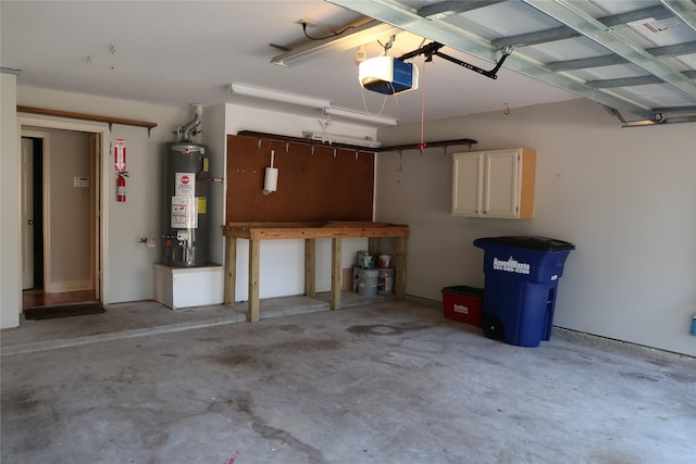 1714 Oak Ridge Dr, Kemah, TX 77565 - garage featuring gas water heater and a garage door opener