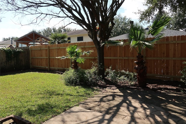 1714 Oak Ridge Dr, Kemah, TX 77565 - fenced backyard featuring a patio area