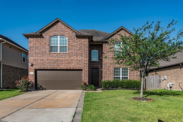 12610 Marley Hills Trl, Houston, TX 77089 - traditional-style home with brick siding, concrete driveway, an attached garage, a front lawn, and a shingled roof