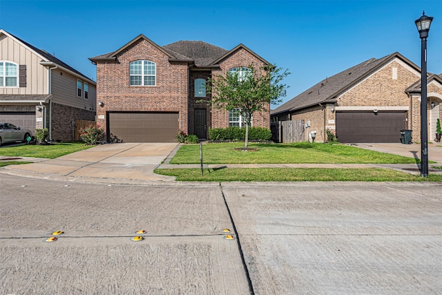 12610 Marley Hills Trl, Houston, TX 77089 - traditional-style house with brick siding, driveway, a front yard, and an attached garage
