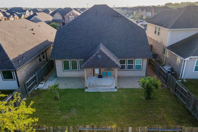 12610 Marley Hills Trl, Houston, TX 77089 - rear view of property featuring a patio, a residential view, a shingled roof, and a fenced backyard