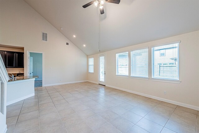 12610 Marley Hills Trl, Houston, TX 77089 - unfurnished living room featuring ceiling fan, light tile patterned floors, recessed lighting, and high vaulted ceiling