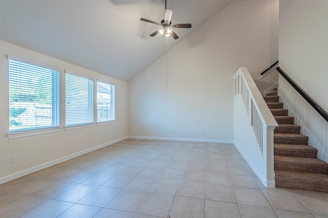 12610 Marley Hills Trl, Houston, TX 77089 - unfurnished living room featuring light tile patterned flooring, a ceiling fan, stairs, and high vaulted ceiling