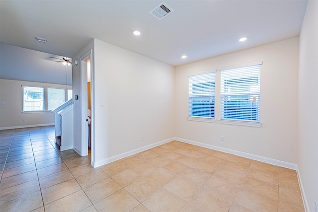 12610 Marley Hills Trl, Houston, TX 77089 - spare room featuring recessed lighting, ceiling fan, light tile patterned floors, and stairs