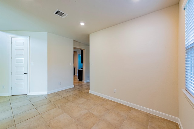12610 Marley Hills Trl, Houston, TX 77089 - spare room with recessed lighting and light tile patterned floors