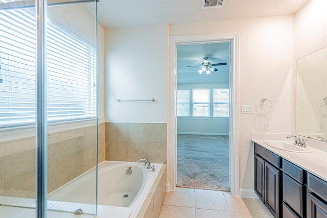 12610 Marley Hills Trl, Houston, TX 77089 - full bath featuring vanity, a bath, tile patterned floors, and ceiling fan