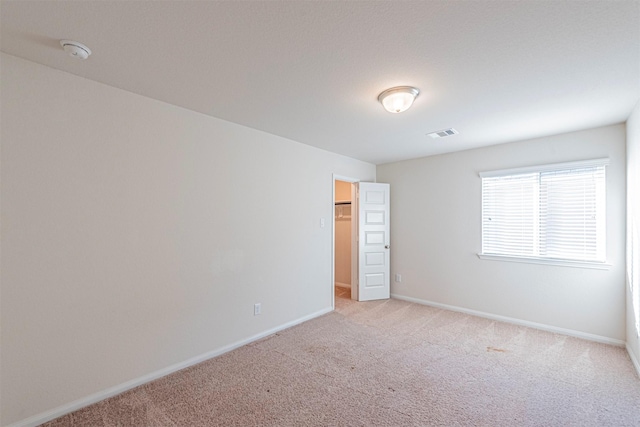 12610 Marley Hills Trl, Houston, TX 77089 - unfurnished bedroom with light colored carpet and a walk in closet