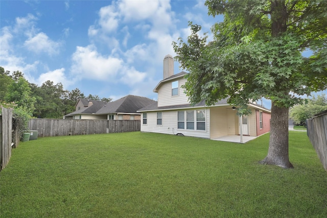31 Hearthwick Rd, Tomball, TX 77375 - fenced backyard with a patio area