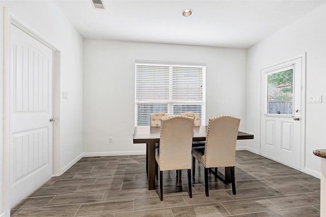 31 Hearthwick Rd, Tomball, TX 77375 - dining space featuring wood tiled floors and recessed lighting